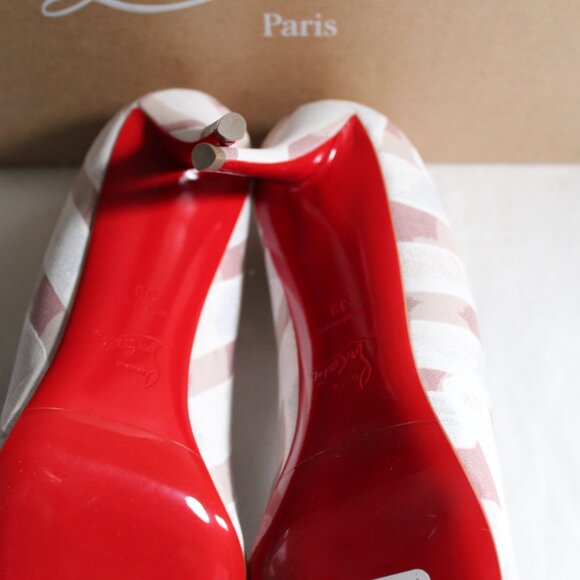 The Miss Z pumps from Christian Louboutin feature a charming all-over print set - Picture 7 of 7